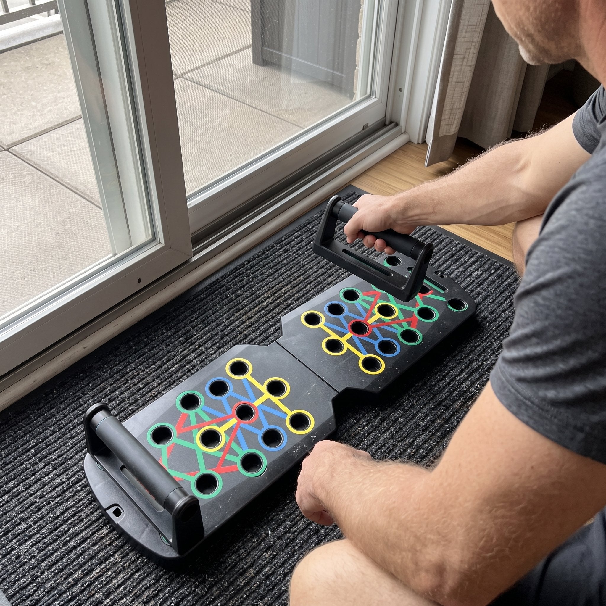 Alex W. with a Rep Ready folding push-up board